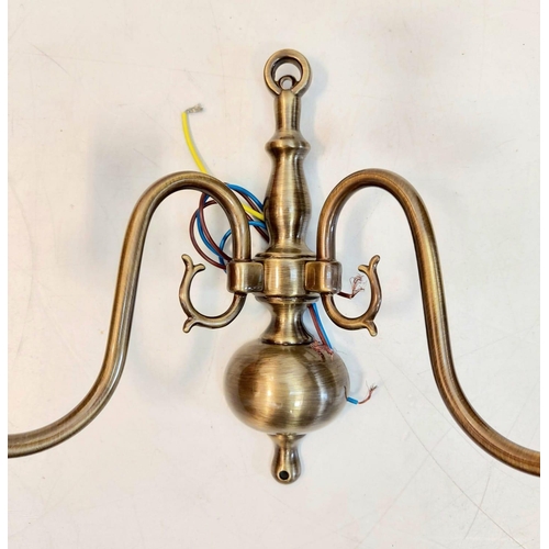 485 - A pair of gilded wall lights, with brass effect. Made by Franklite, unused - as new. 32 x 20cm.