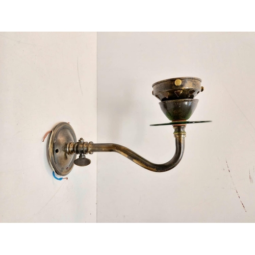 487 - A pair of brass wall lights with green reflectors. Manufactured by The Great British Lighting Compan... 