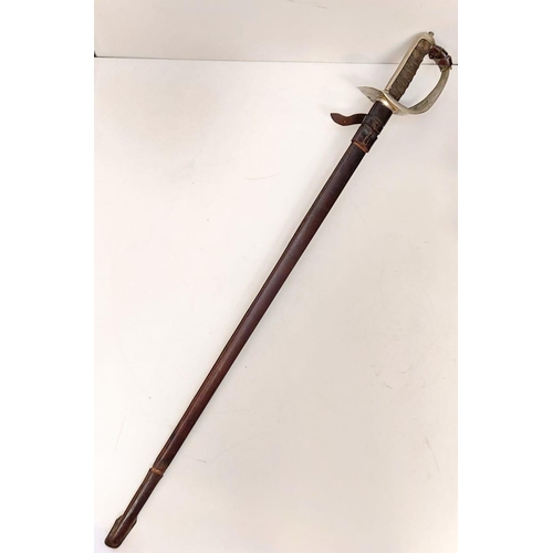 96 - An antique circa 1910's infantry officer's sword complete with original field service leather scabba... 