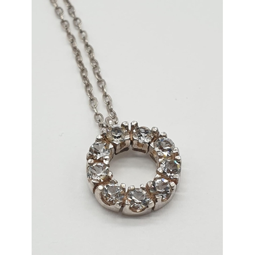 472 - Silver CZ hoop pendant on a 35cm long silver chain, 2.1g weight