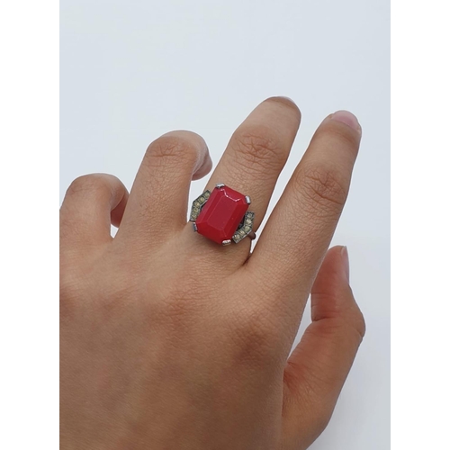 473 - Silver dress ring with red stone. 3g, size M.