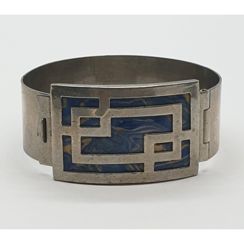 482 - Silver and blue enamel bangle, 22.7g.