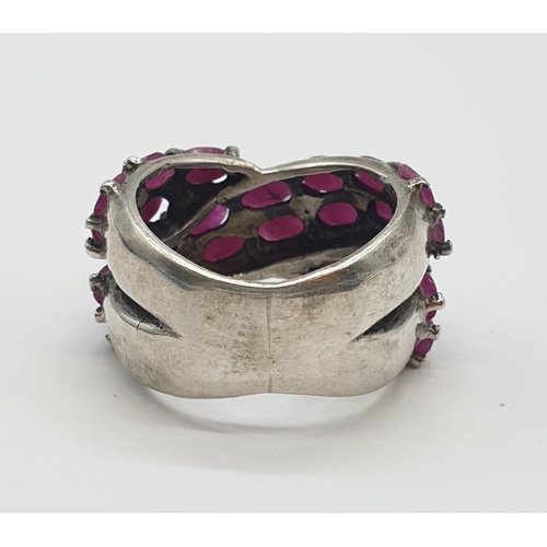 483 - Silver and pink stone ring. 10.3g, size M.