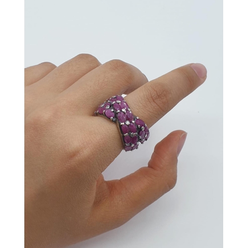 483 - Silver and pink stone ring. 10.3g, size M.