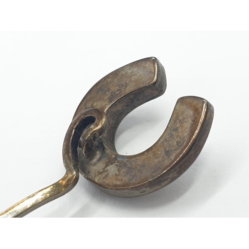 493 - Vintage horse shoe stick pin, 1.9g weight and 8cm long