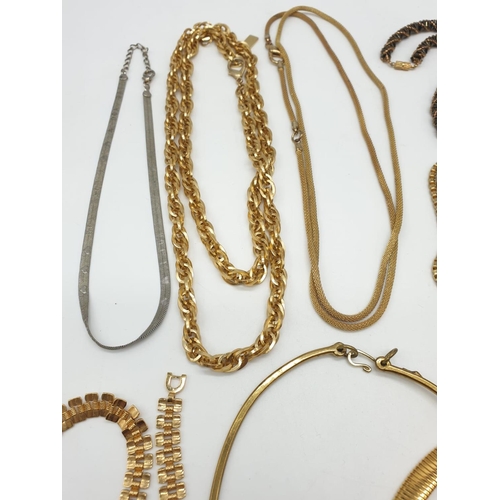 436 - A dozen costume Jewellery Necklaces with Gold Silver effects