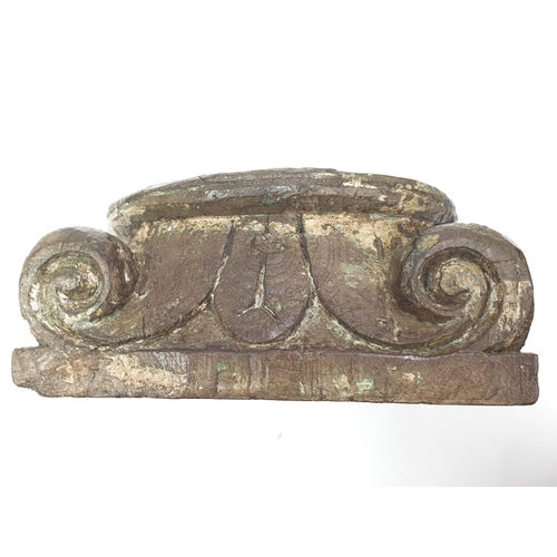 642 - An antique wooden Indian temple candle holder base. Late 19th century. Dimensions 20cm x 20cm.