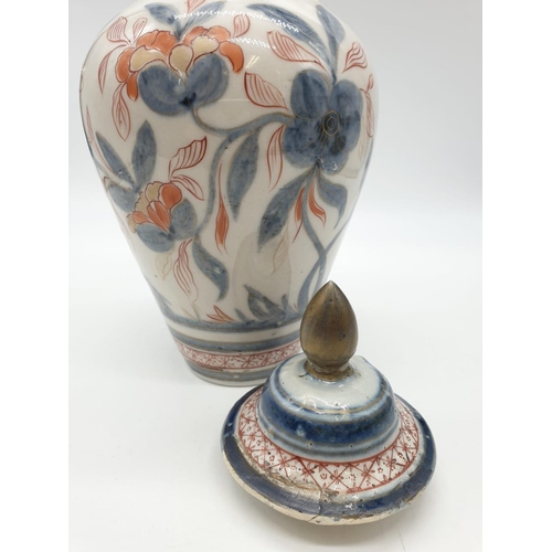 109 - Early Chinese ginger jar with lid, hand painted floral design with some cracked damage at mouth of j... 