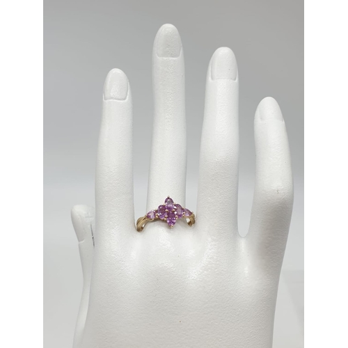 217 - Pink topaz set in 10ct gold ring, weight 2.3g, size P