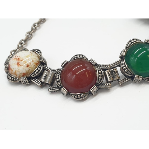 221 - Scottish stone set necklace, bracelet & Celtic cross. 73g in weight.