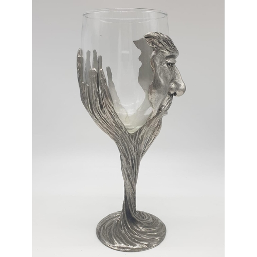 249 - A decorative cut glass small vase with rose-tinted handles, connected to an antique sterling silver ... 