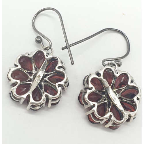 303 - silver stone set earrings floral design, weight 4.6g