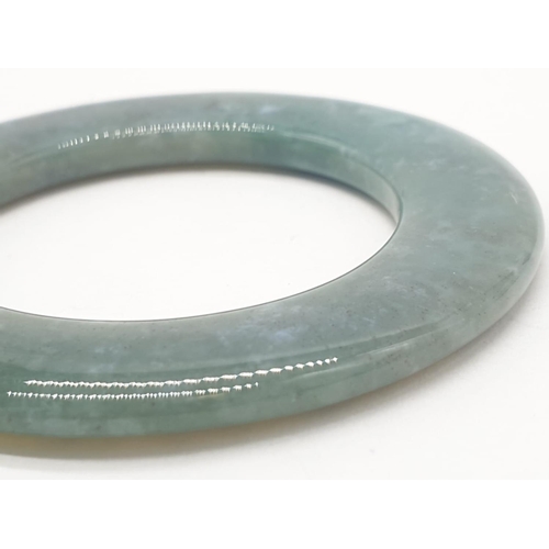 492 - Large Jade hoop weight 13.4g and 5cm diameter