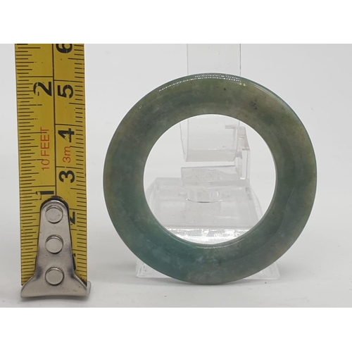 492 - Large Jade hoop weight 13.4g and 5cm diameter