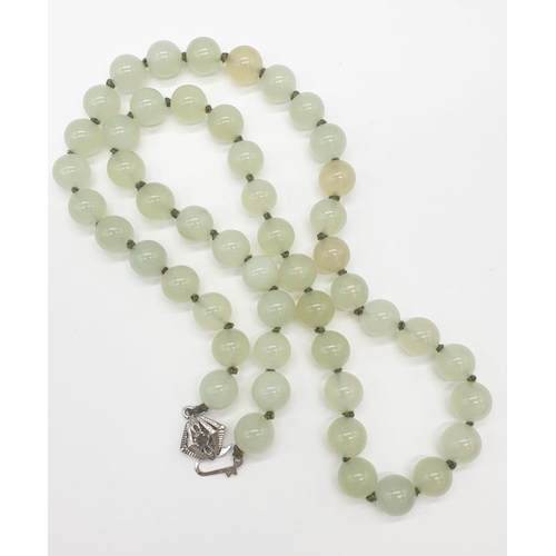 508 - Light transparent jade necklace, weight 117g and 64cm long approx