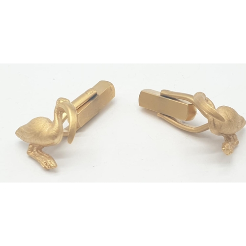 690 - Yellow metal pelican cufflinks