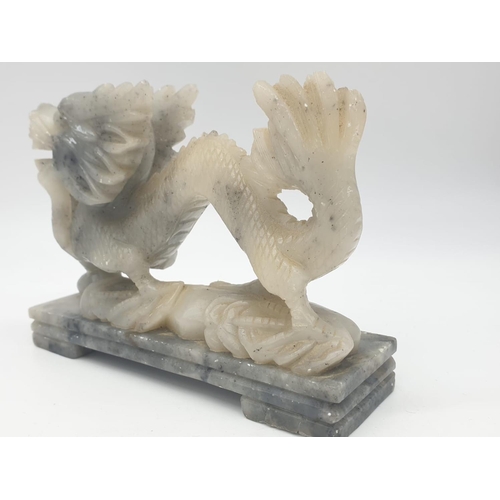 742 - Hand carved dragon ornament on a marble plinth, 13x4x10cm approx