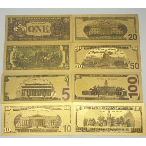 776 - 8x gold plated US dollars assorted denominations