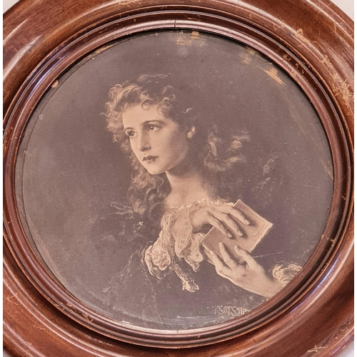 789 - An antique circular print of a 'Women with a Secret' in a walnut frame. Diameter 34cm.