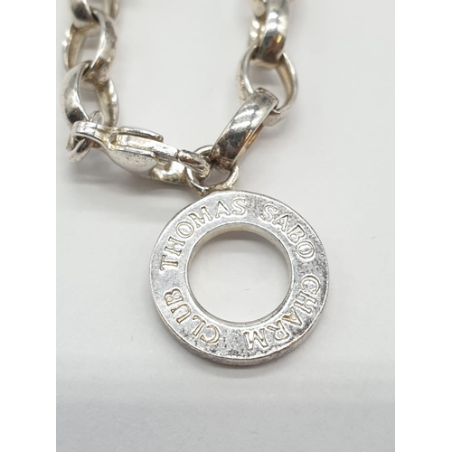 822 - Silver Thomas Sabo Bracelet with Charms. All charms are silver having Thomas Sabo markings. 7.5 inch... 