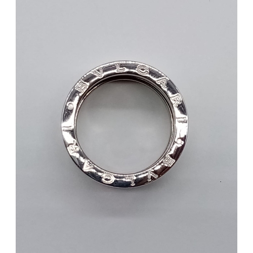 10 - 18CT WHITE GOLD BVLGARI SPRING ZERO RING, WEIGHT 12.13G AND SIZE M/O