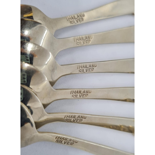 160 - Set of 6 silver coffee spoons from Thailand. Having deighties to top of handles. Clear marking for s... 