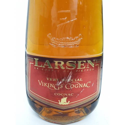 206 - A bottle of vintage Larsen Viking cognac.