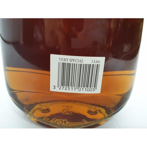 206 - A bottle of vintage Larsen Viking cognac.