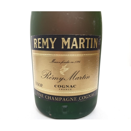 213 - A bottle of vintage V.S.O.P Remy Martin cognac.