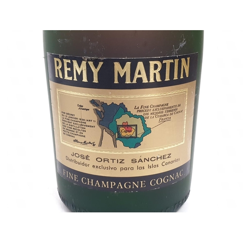 213 - A bottle of vintage V.S.O.P Remy Martin cognac.