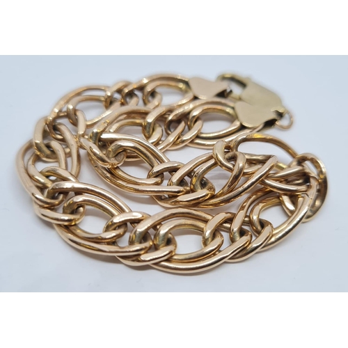 230 - 9ct gold bracelet with unusual and attractive designer links. Full hallmark for 9 carat gold. 19.75c... 