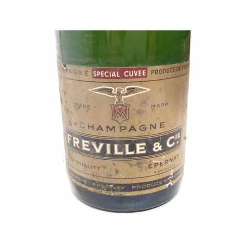 234 - A bottle of vintage Freville Champagne.