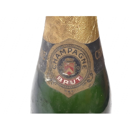 234 - A bottle of vintage Freville Champagne.