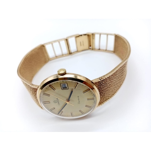 26 - OMEGA Geneve 9ct gold vintage gent watch, manual wind with date box and solid gold strap, 32mm case ... 