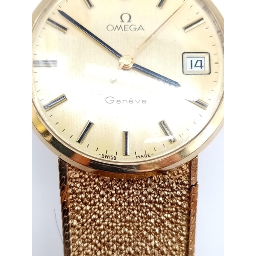 26 - OMEGA Geneve 9ct gold vintage gent watch, manual wind with date box and solid gold strap, 32mm case ... 