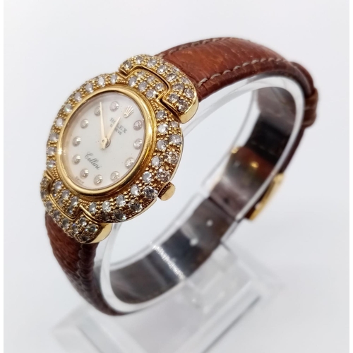 29 - Vintage 18ct gold Rolex Geneve Cellini ladies watch with round face and diamond encrusted bezel and ... 