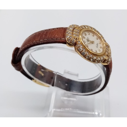 29 - Vintage 18ct gold Rolex Geneve Cellini ladies watch with round face and diamond encrusted bezel and ... 