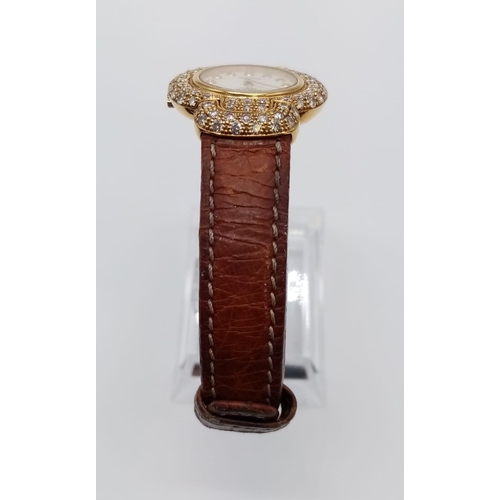 29 - Vintage 18ct gold Rolex Geneve Cellini ladies watch with round face and diamond encrusted bezel and ... 