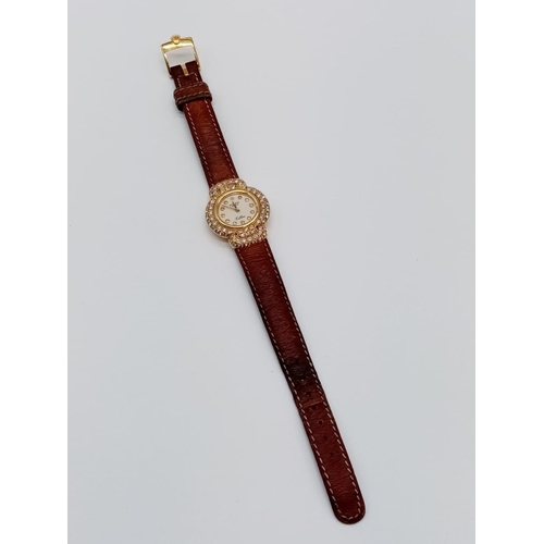 29 - Vintage 18ct gold Rolex Geneve Cellini ladies watch with round face and diamond encrusted bezel and ... 