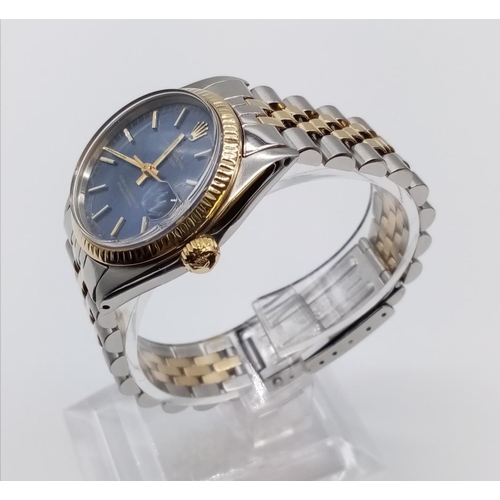 47 - Rolex Oyster Perpetual Datejust watch, blue face with gold bezel, two tone strap, 31mm case