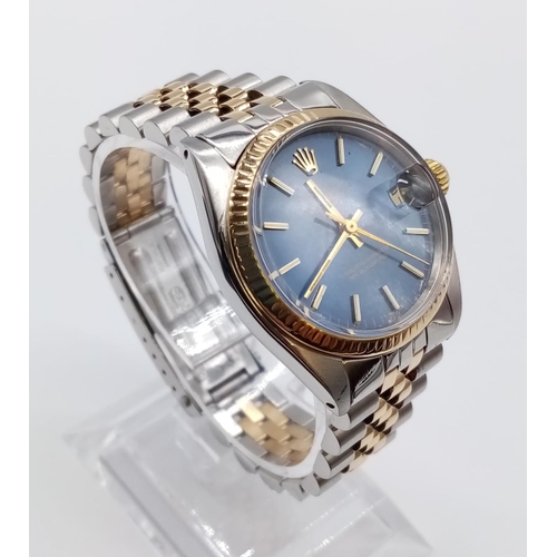 47 - Rolex Oyster Perpetual Datejust watch, blue face with gold bezel, two tone strap, 31mm case