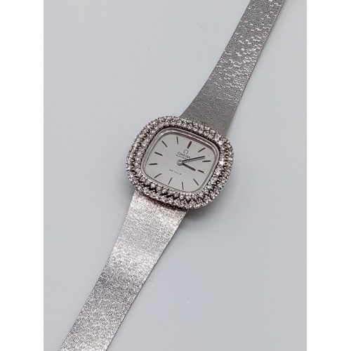 52 - Vintage 18ct white gold OMEGA de Ville ladies automatic watch, square face with diamond encrusted be... 