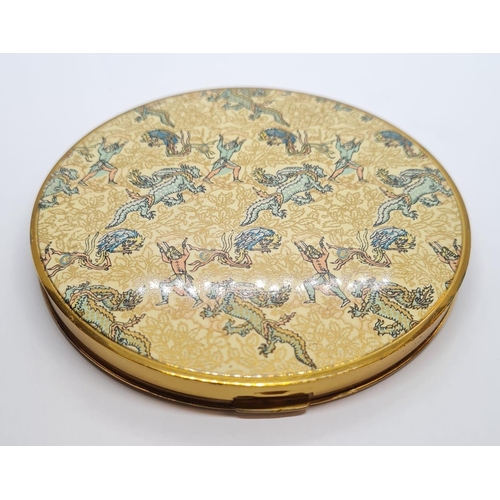 565 - Vintage Vogue Vanities compact having enamelled lid with dragons and dancers. Larger than normal. Mi... 