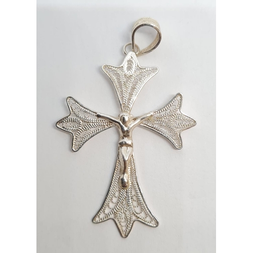 572 - Silver filigree crucifix in attractive modernist form. 4.5cm drop approx. Gift boxed.