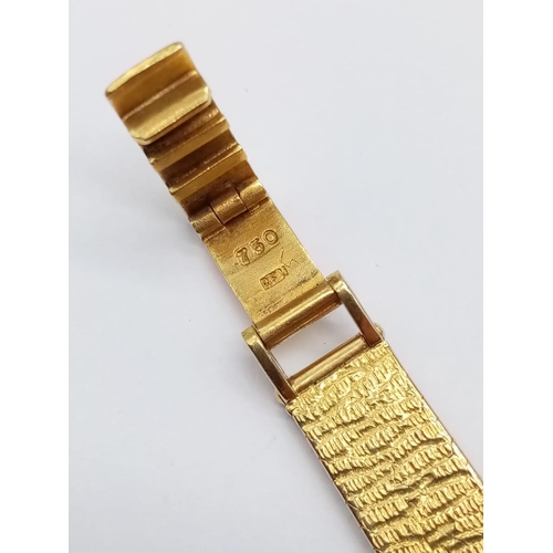 59 - Vintage 18ct gold Baume & Mercier Geneve ladies cocktail watch with round face and enamel bezel, sol... 