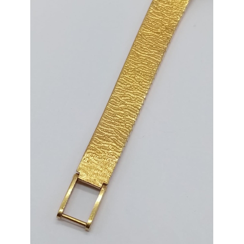 59 - Vintage 18ct gold Baume & Mercier Geneve ladies cocktail watch with round face and enamel bezel, sol... 