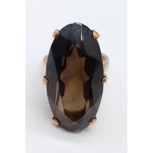 717 - 9ct vintage ring with large smoky quartz, size U and weight 8.75g