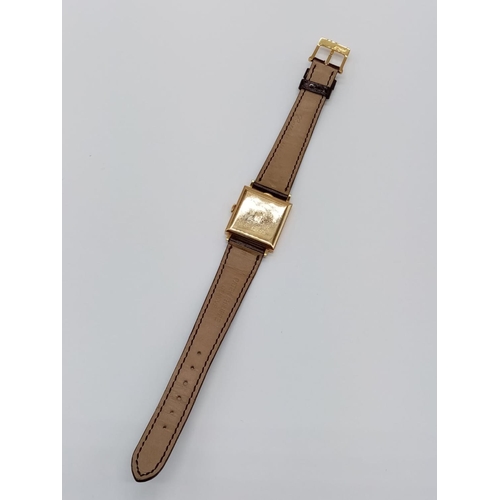 77 - Vintage Patek Philippe Geneve 18ct gold tank watch, square face 25mm and brown leather strap