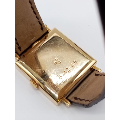 77 - Vintage Patek Philippe Geneve 18ct gold tank watch, square face 25mm and brown leather strap