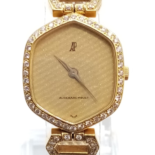 87 - Vintage 18ct gold Audemars Piguet ladies watch with diamond encrusted bezel and shoulders, twisted r... 